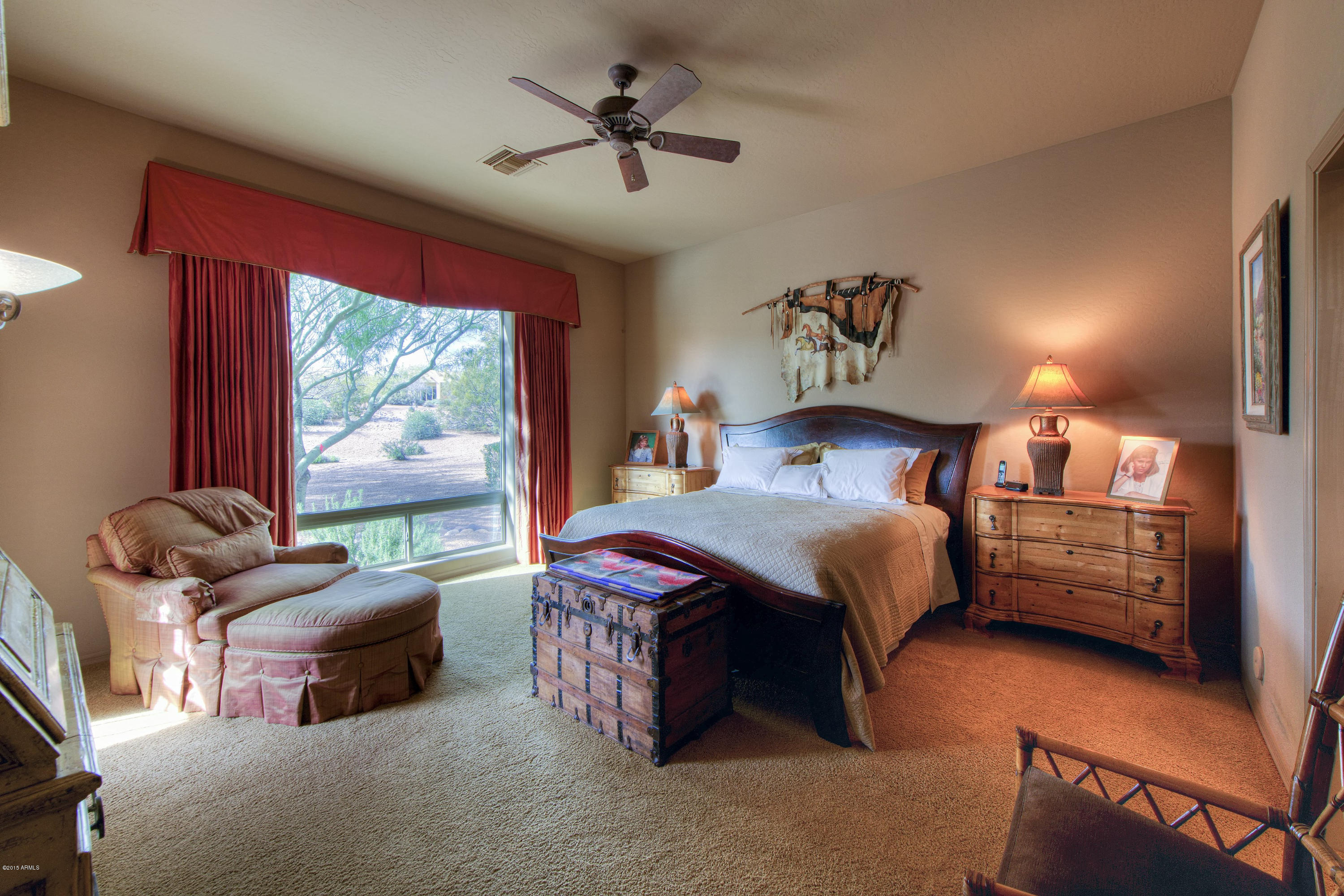 27822 North Quail Spring Road Rio Verde, AZ 85263 - Photo 10 of 33 a bedroom with furniture and a large window