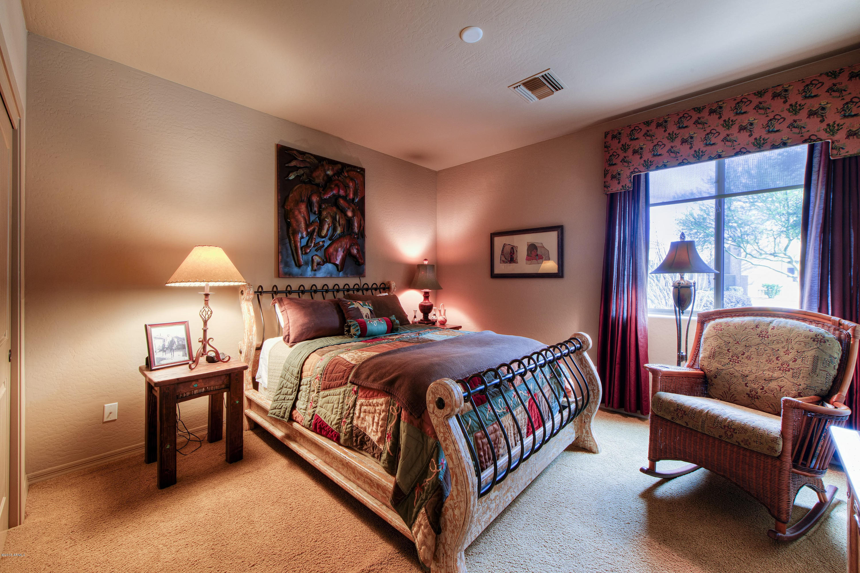 27822 North Quail Spring Road Rio Verde, AZ 85263 - Photo 13 of 33 a bedroom with a bed and window