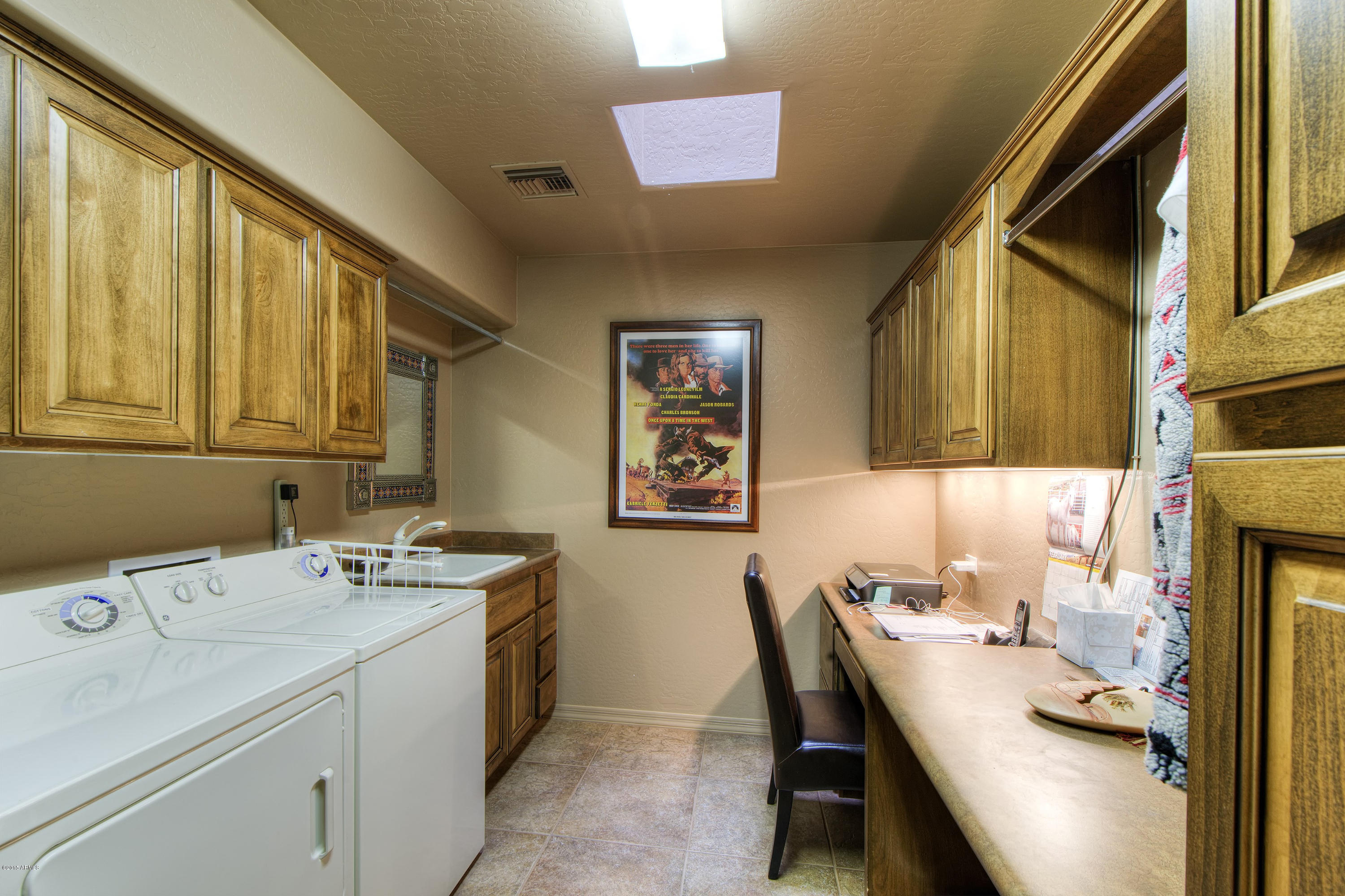 27822 North Quail Spring Road Rio Verde, AZ 85263 - Photo 15 of 33 a bathroom with a sink and a mirror