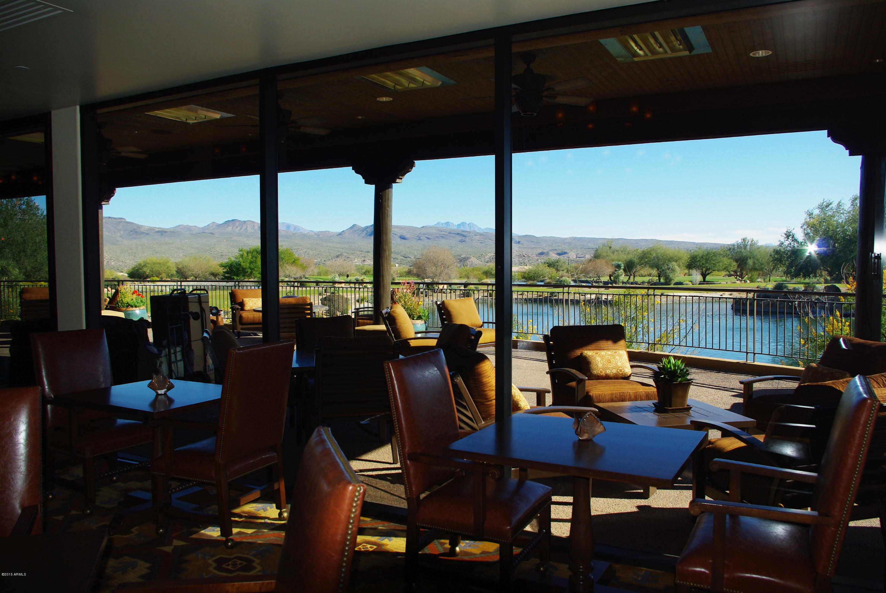 27822 North Quail Spring Road Rio Verde, AZ 85263 - Photo 25 of 33 a view of a chairs and table in patio with a lake view