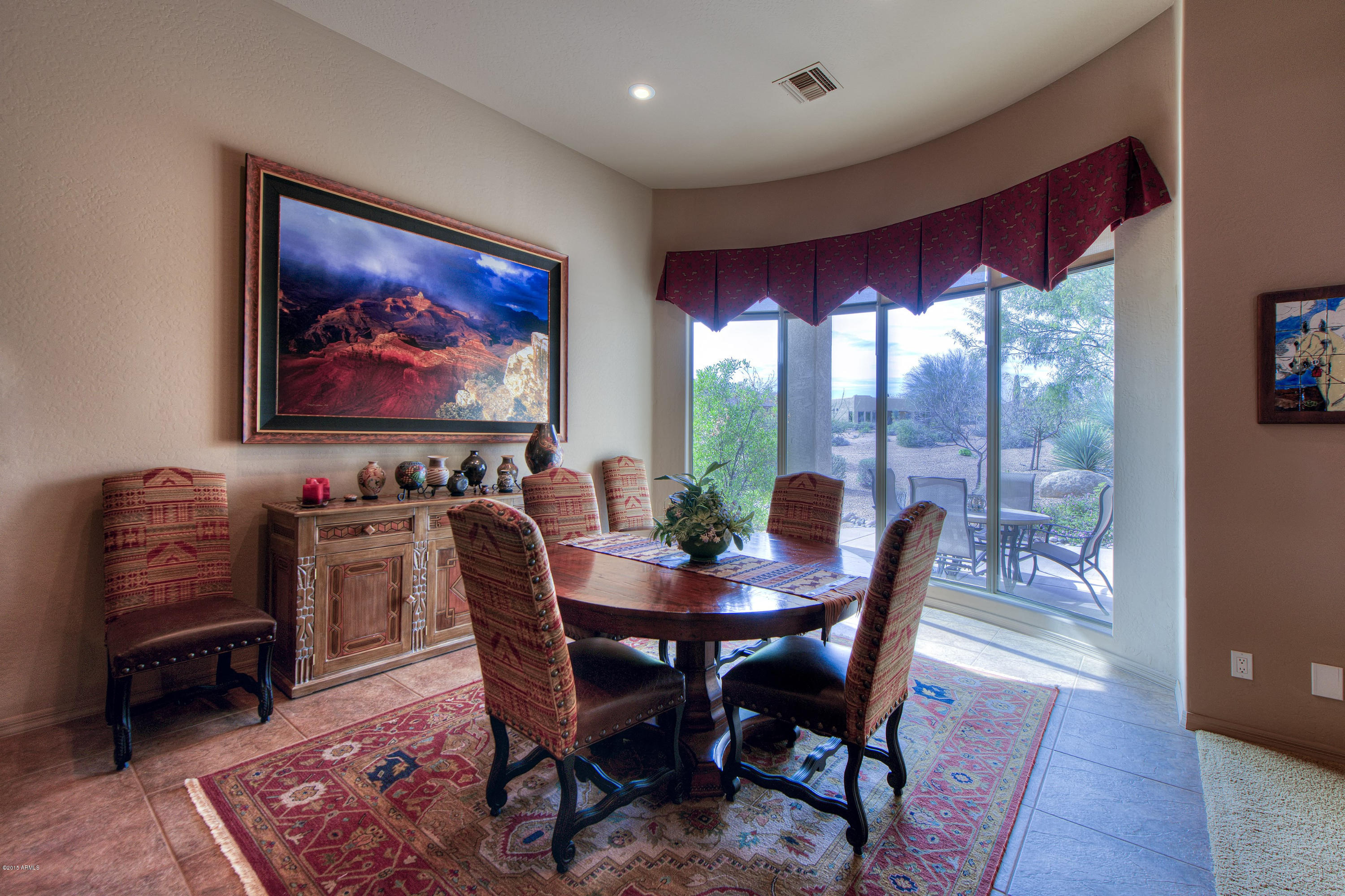 27822 North Quail Spring Road Rio Verde, AZ 85263 - Photo 5 of 33 a view of a dining room with furniture window and wooden floor
