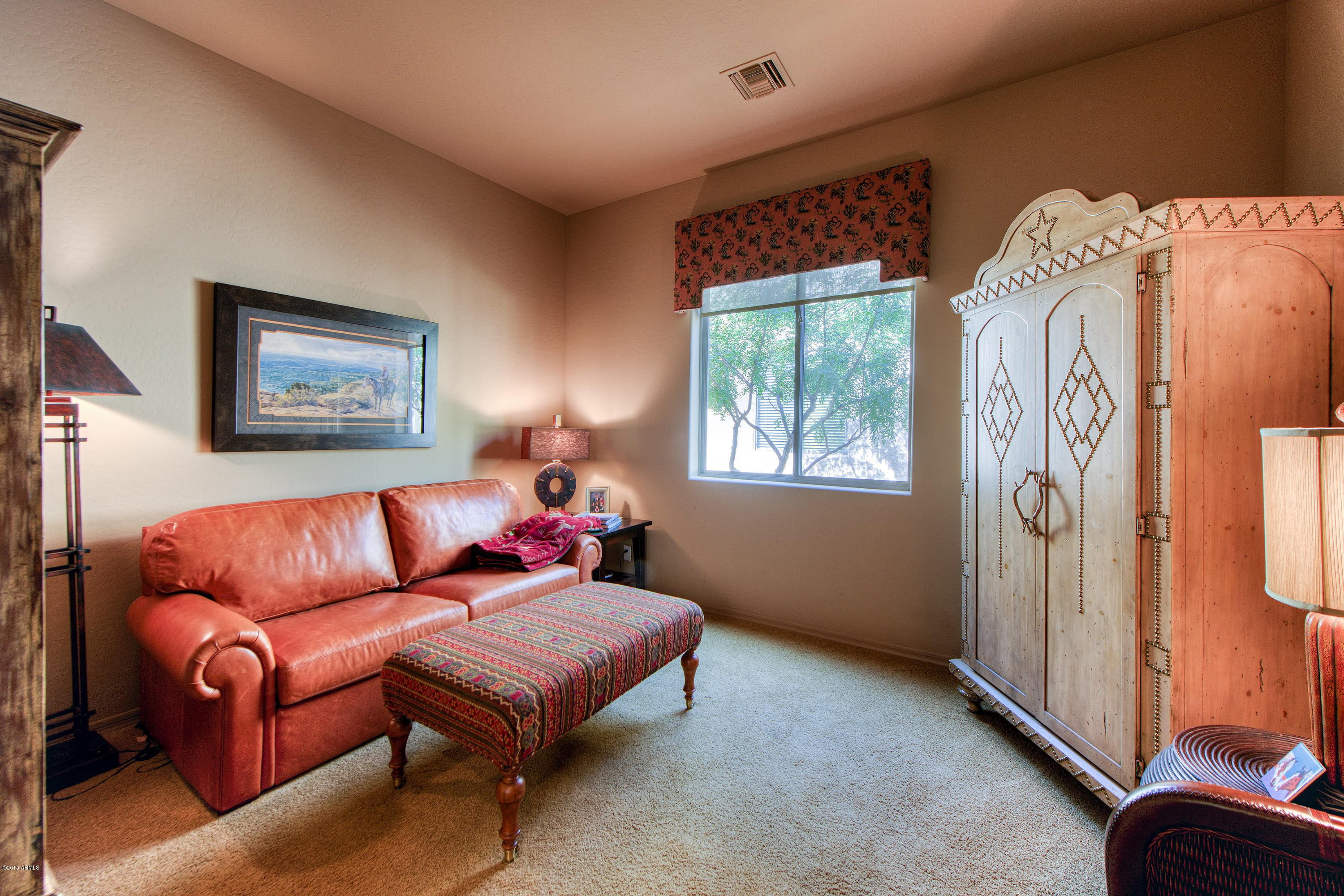 27822 North Quail Spring Road Rio Verde, AZ 85263 - Photo 9 of 33 a living room with furniture and a window