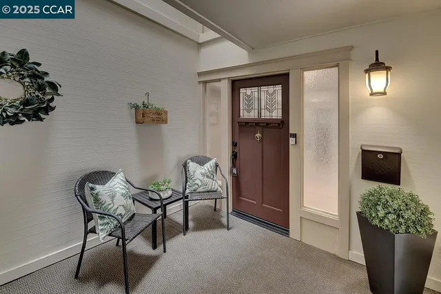 a view of a hallway with seating area