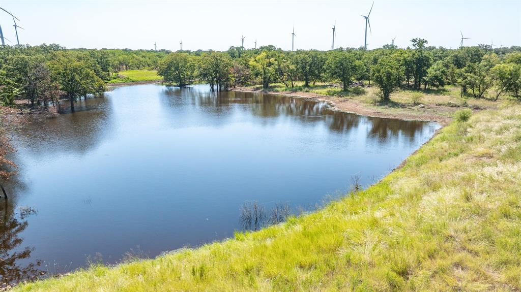 1712 Wells East Road Newcastle, TX 76372 - Photo 3 of 40 a view of a lake with houses