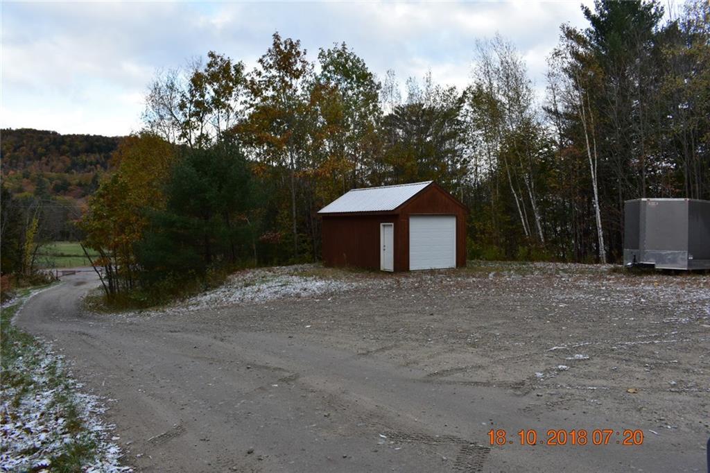119 Hawk Lane/andover Road Rumford, ME 04276 - Photo 13 of 35 One car garage sits on the 5+ acre...