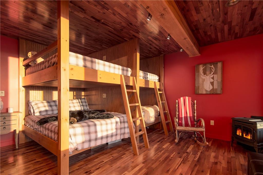 119 Hawk Lane/andover Road Rumford, ME 04276 - Photo 24 of 35 The second bedroom houses four bunks...