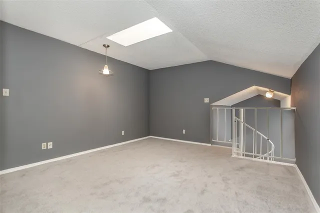 an empty room with closet area