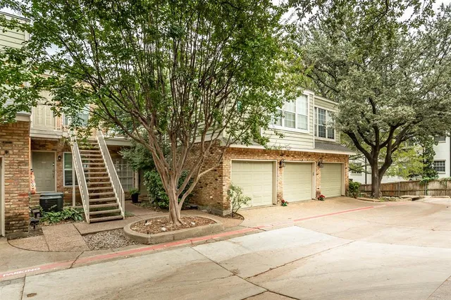 a picture of a building with a white wall