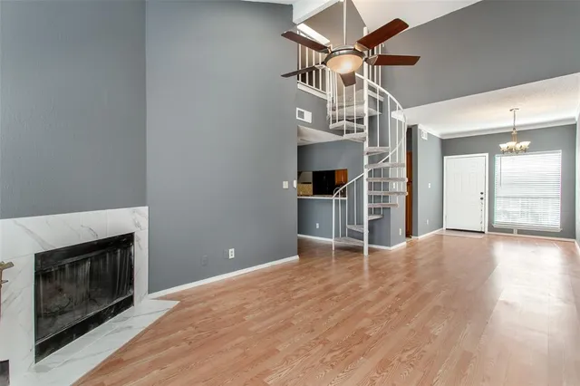 a building view with large trees