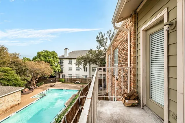 wooden floor in an empty room with a fireplace