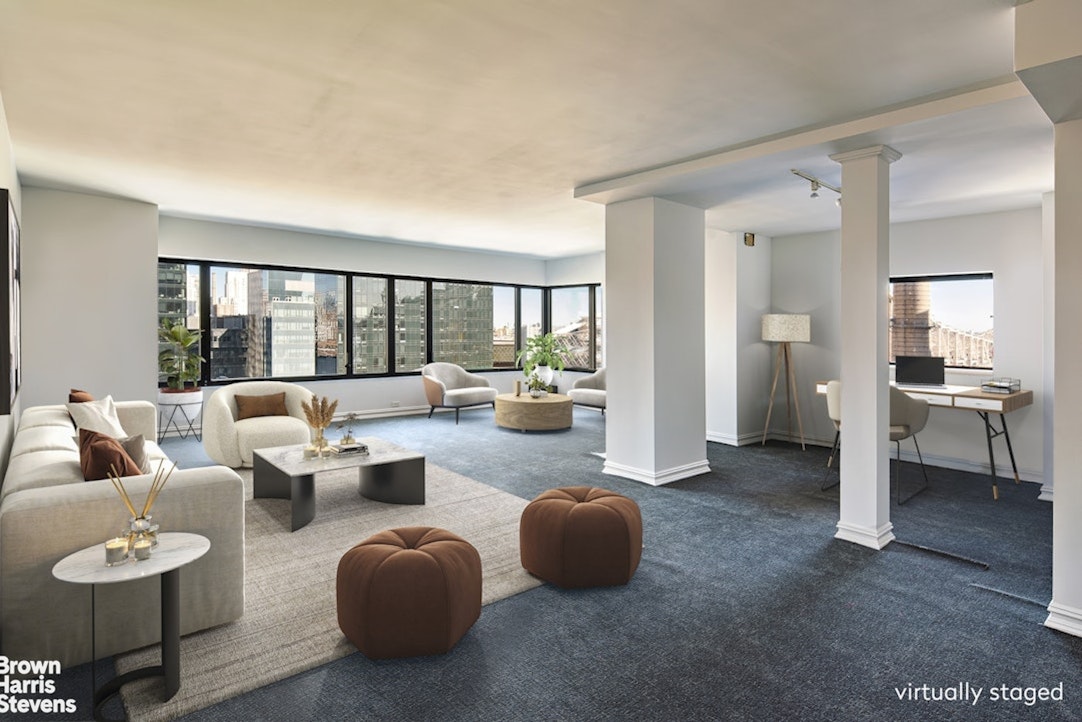 425 East 58th Street, Unit 16AB Manhattan, NY 10022 - Photo 10 of 18 a living room with furniture and a floor to ceiling window