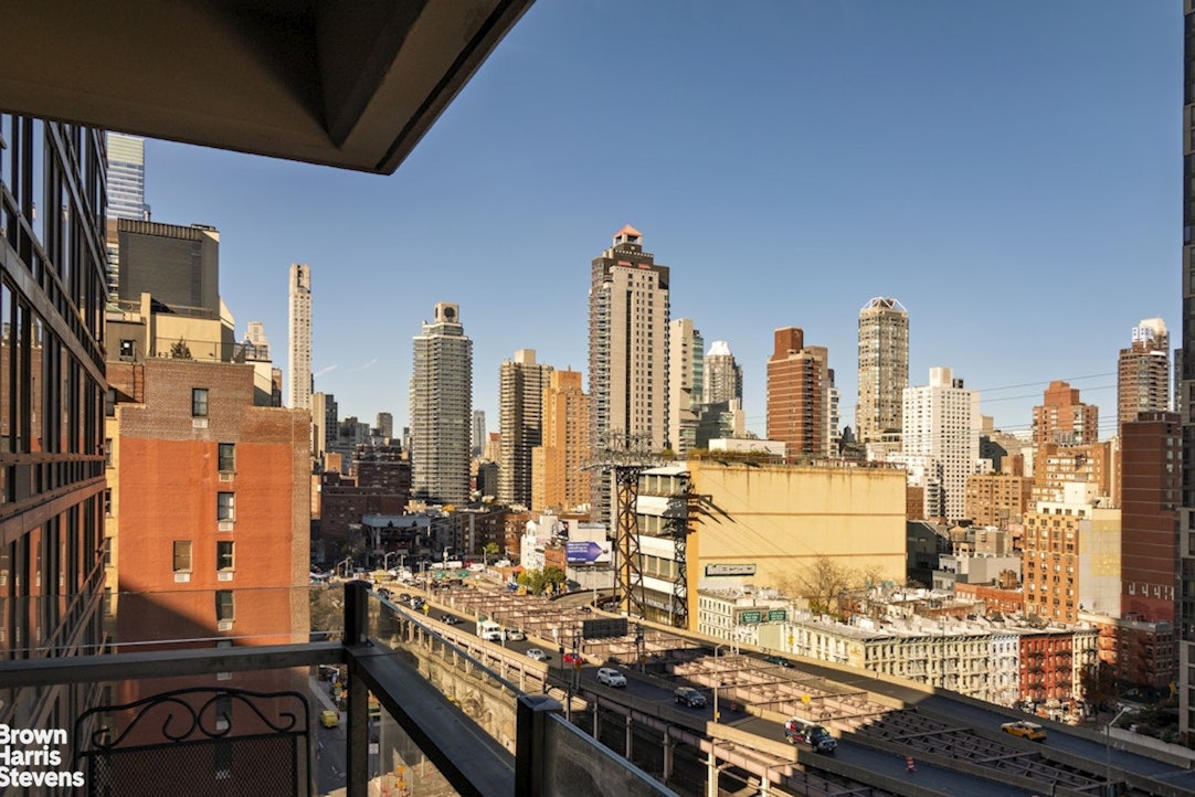 425 East 58th Street, Unit 16AB Manhattan, NY 10022 - Photo 8 of 18 a view of city with tall buildings