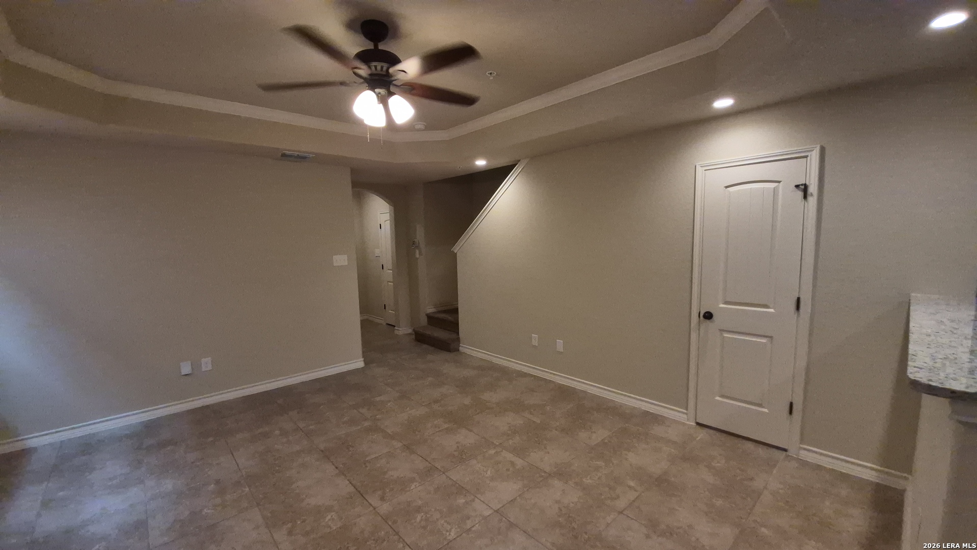 6414 Luglio Lane, Unit 101 San Antonio, TX 78233 - Photo 5 of 23 an empty room with closet and a ceiling fan