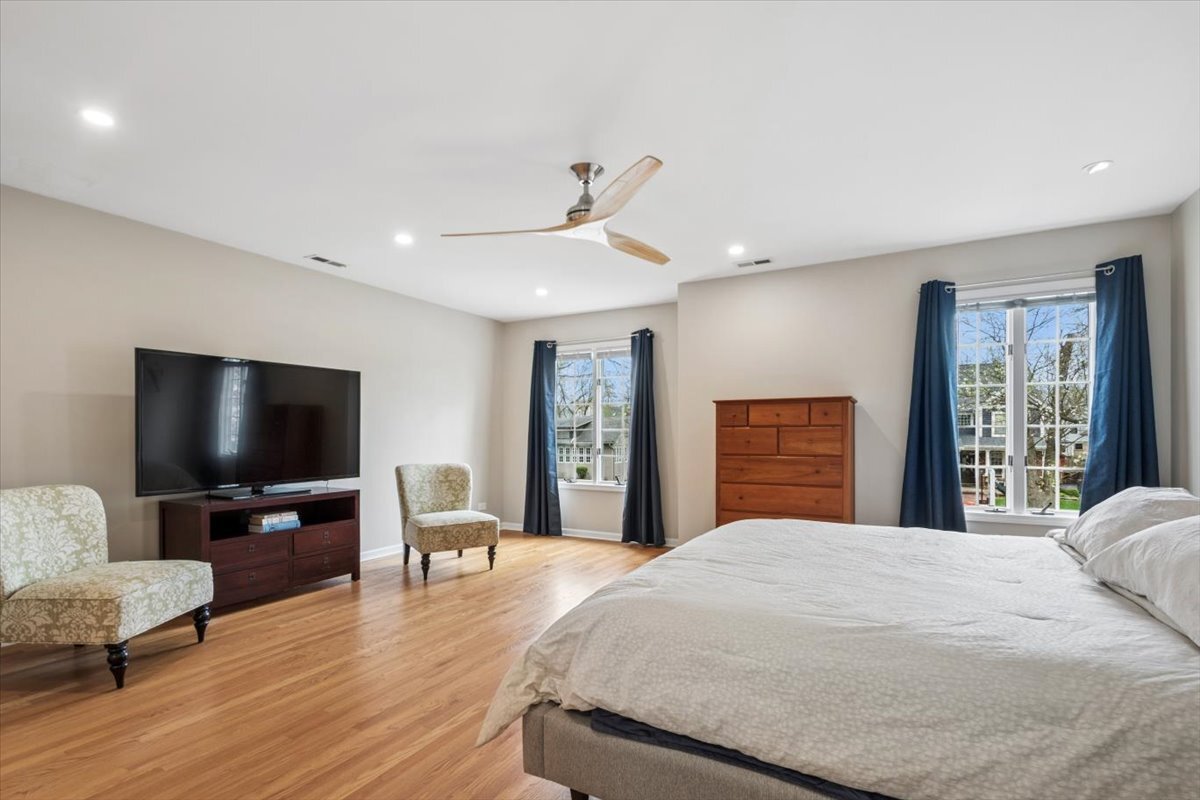 291 Lionel Road Riverside, IL 60546 - Photo 13 of 32 a bedroom with a large bed and a flat screen tv