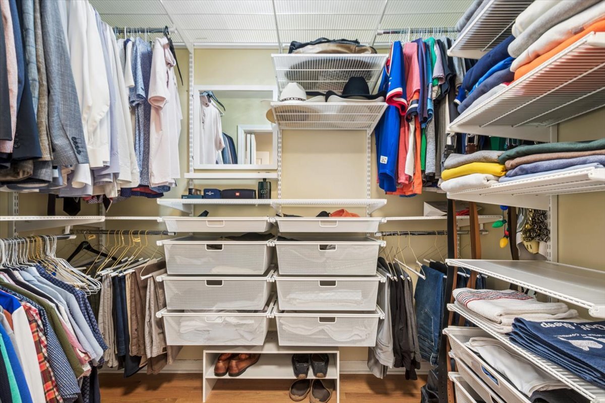 291 Lionel Road Riverside, IL 60546 - Photo 16 of 32 a view of walk in closet with clothes and shoes