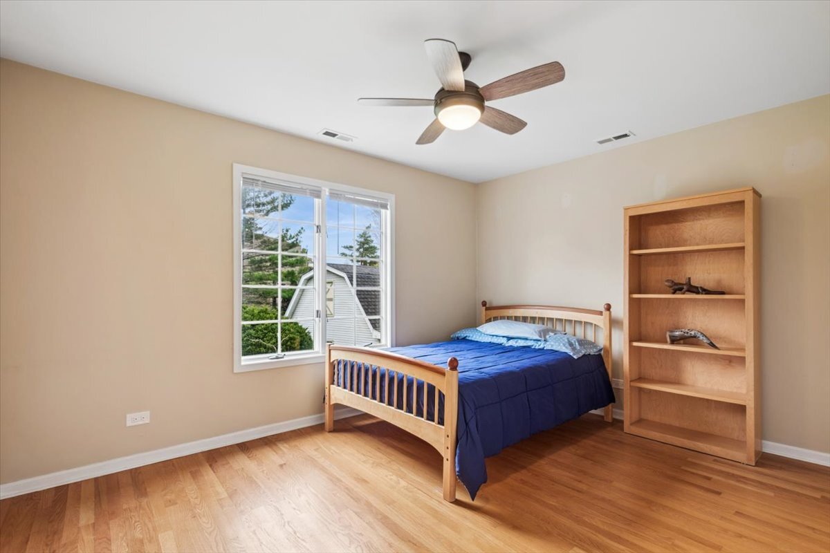 291 Lionel Road Riverside, IL 60546 - Photo 17 of 32 a bedroom with a bed and a window