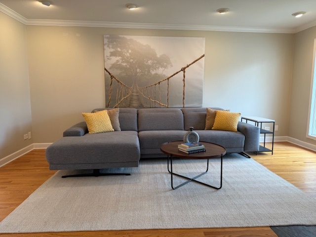 291 Lionel Road Riverside, IL 60546 - Photo 2 of 32 a living room with furniture and a wooden floor