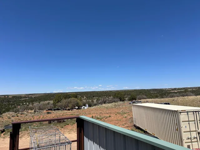 a kitchen with stainless steel appliances granite countertop a refrigerator sink and cabinets