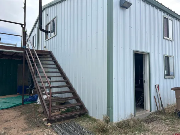 a view of an entryway with staircase