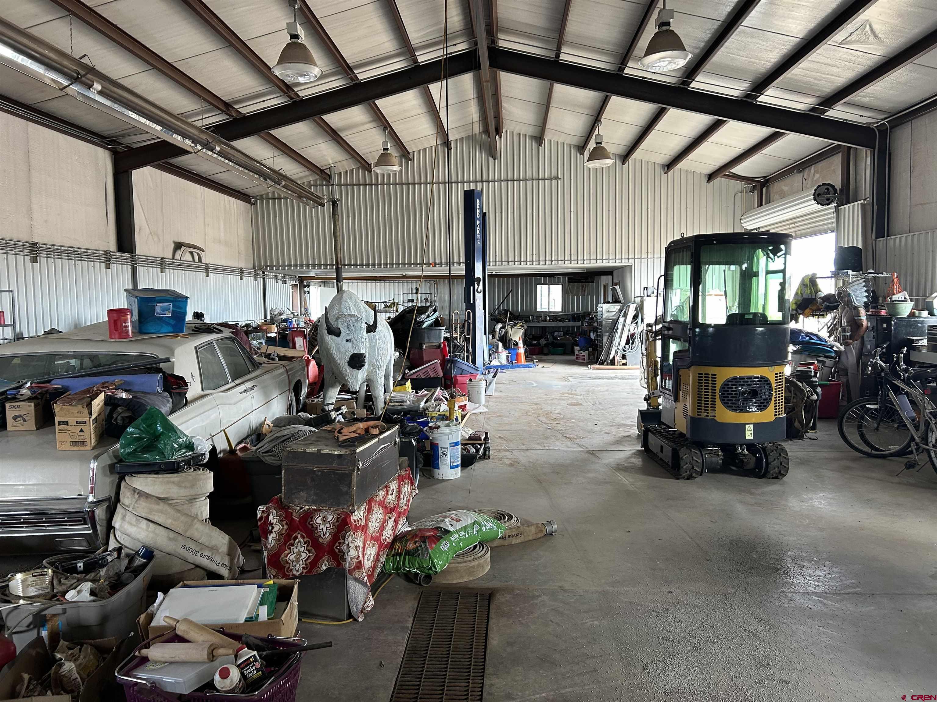 2011 County Road F4 Egnar, CO 81325 - Photo 5 of 34 a view of a garage with storage