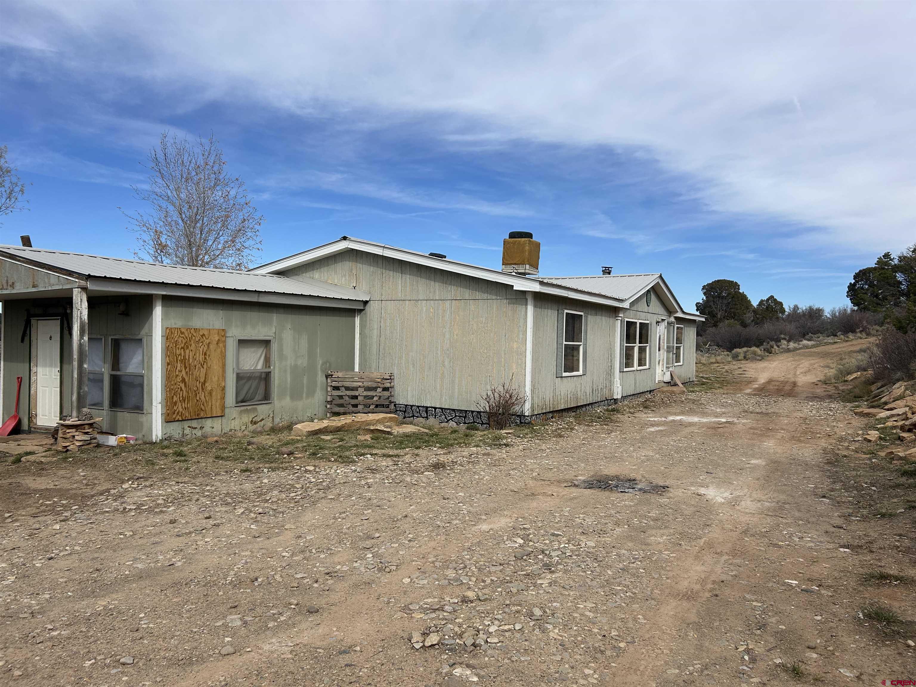 2011 County Road F4 Egnar, CO 81325 - Photo 9 of 34 a view of a house with backyard