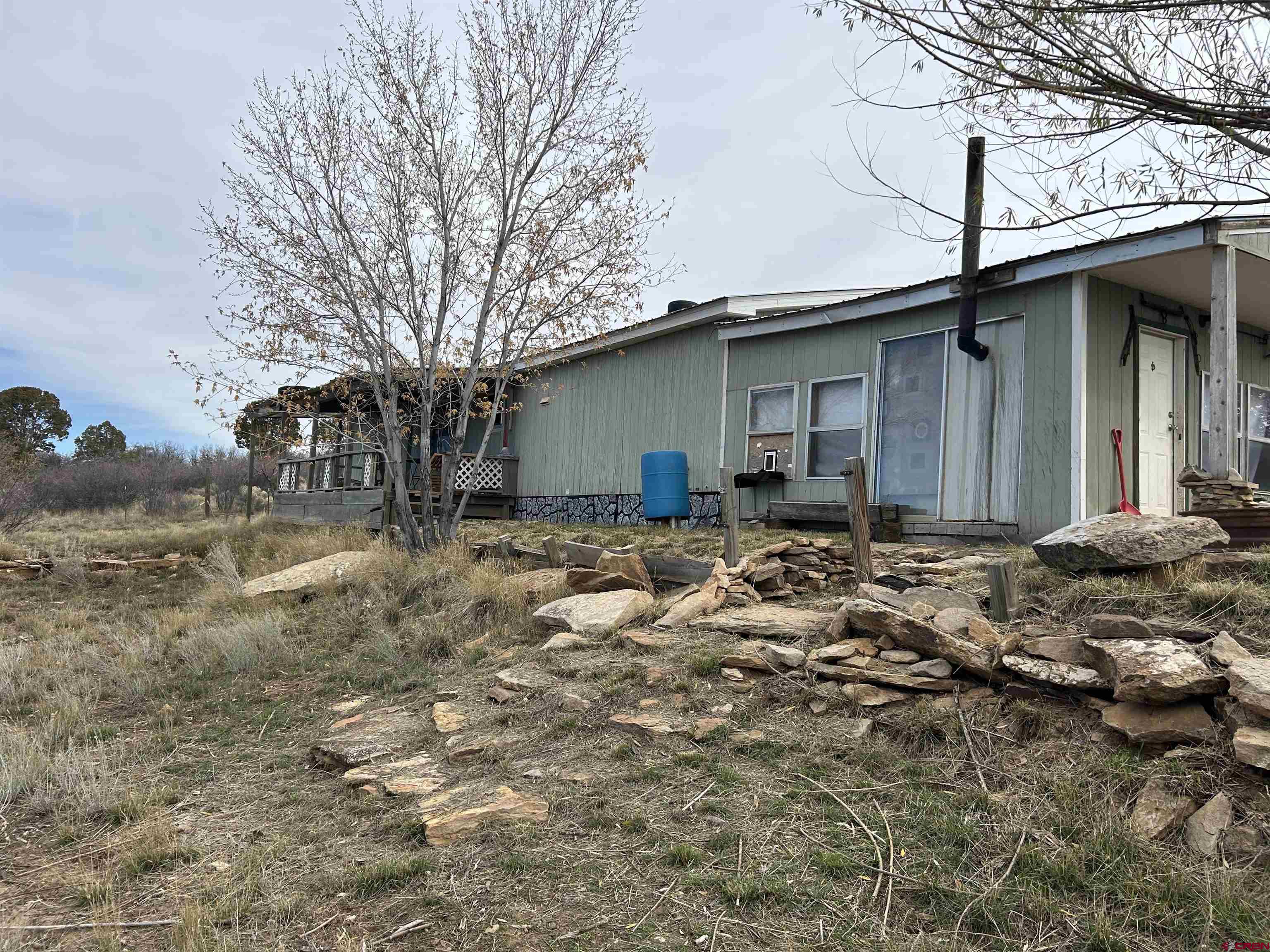 2011 County Road F4 Egnar, CO 81325 - Photo 10 of 34 a backyard of a house