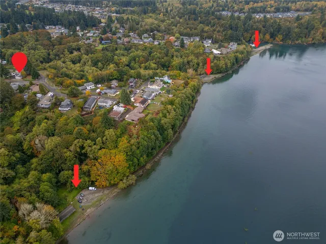 a view of a house with a yard and garage