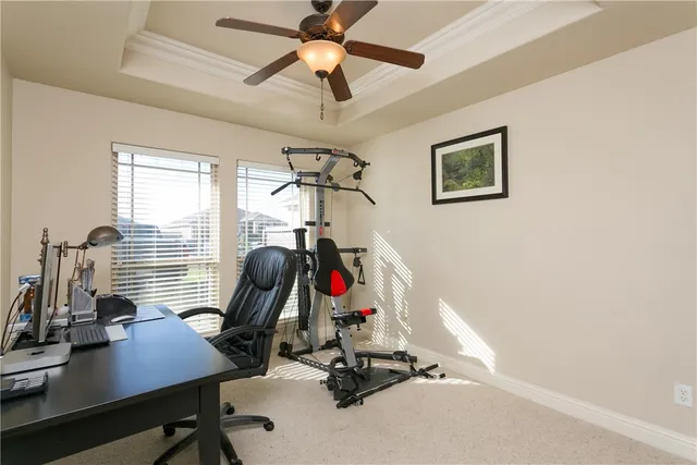 a view of a workspace with gym equipment