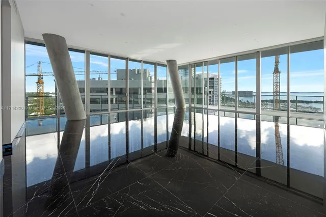 a kitchen with a sink and refrigerator