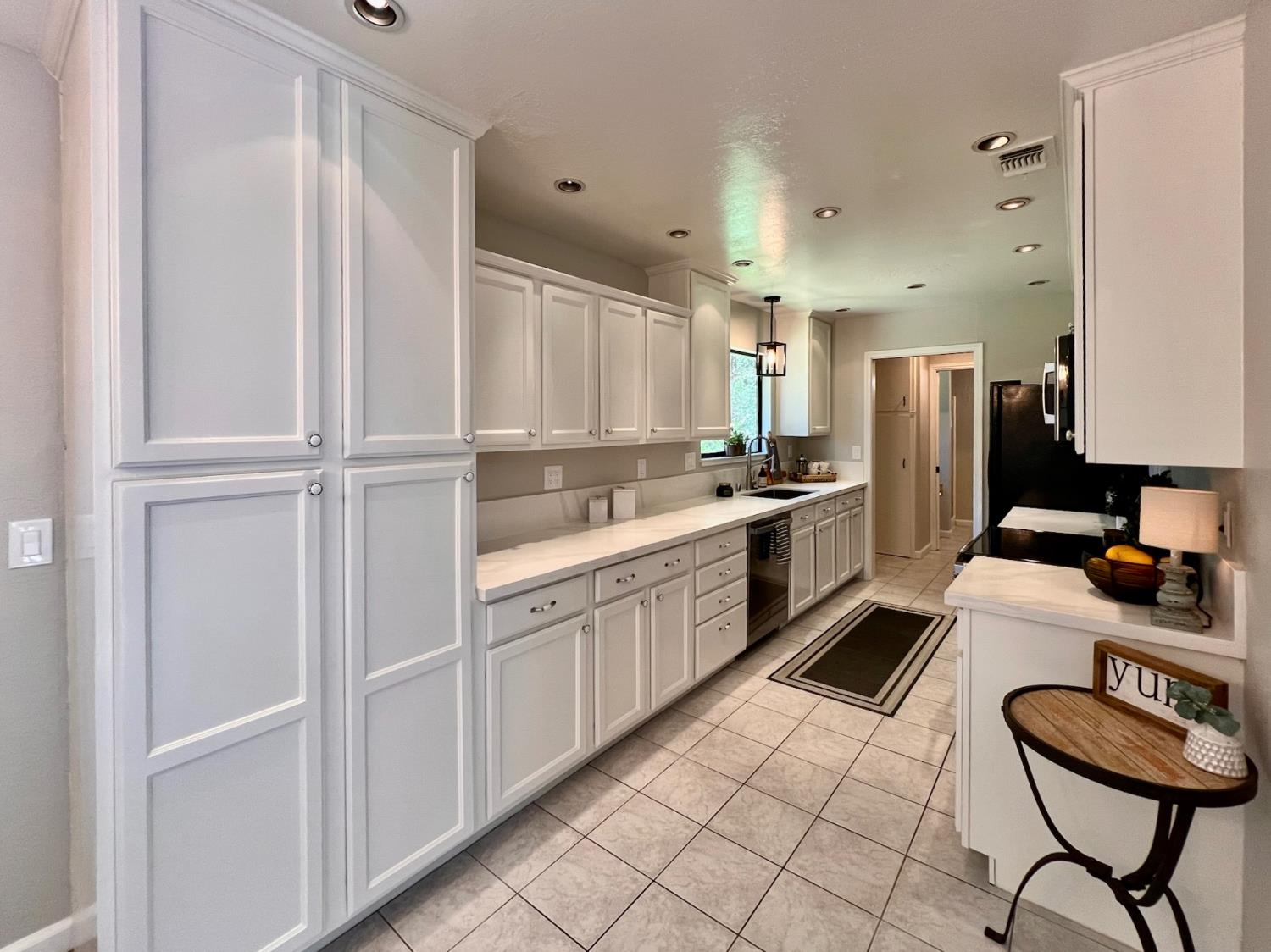 2506 Buffalo Hill Road Georgetown, CA 95634 - Photo 23 of 79 a kitchen with stainless steel appliances granite countertop a sink and cabinets