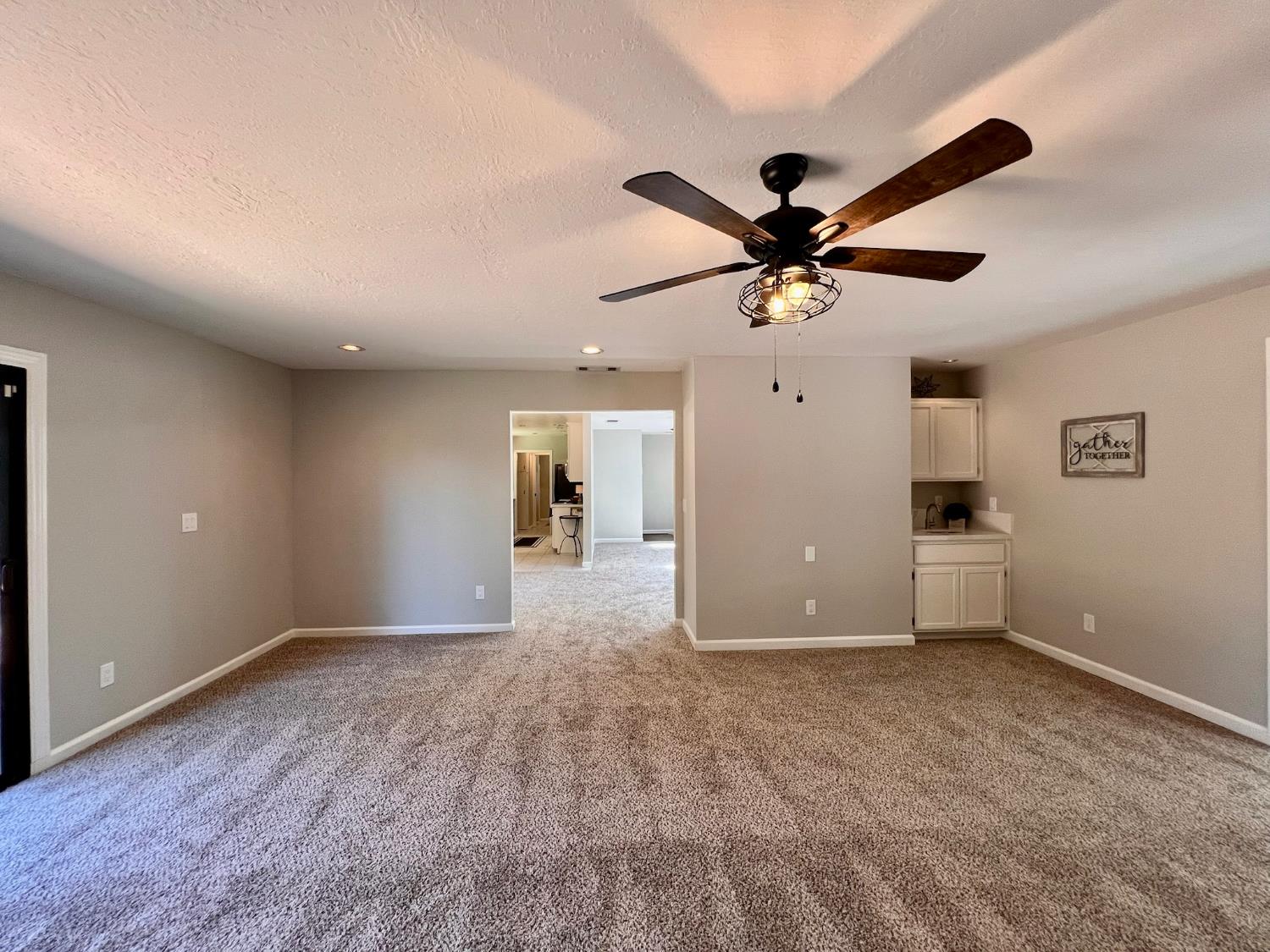 2506 Buffalo Hill Road Georgetown, CA 95634 - Photo 34 of 79 a view of an empty room with a ceiling fan