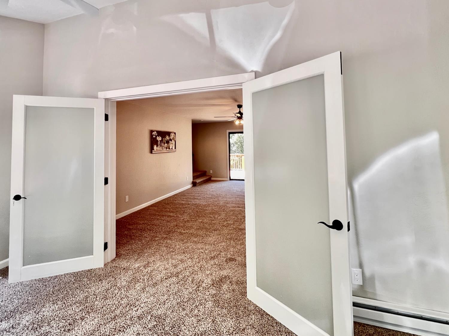 2506 Buffalo Hill Road Georgetown, CA 95634 - Photo 36 of 79 a view of a hallway with wooden floor and closet