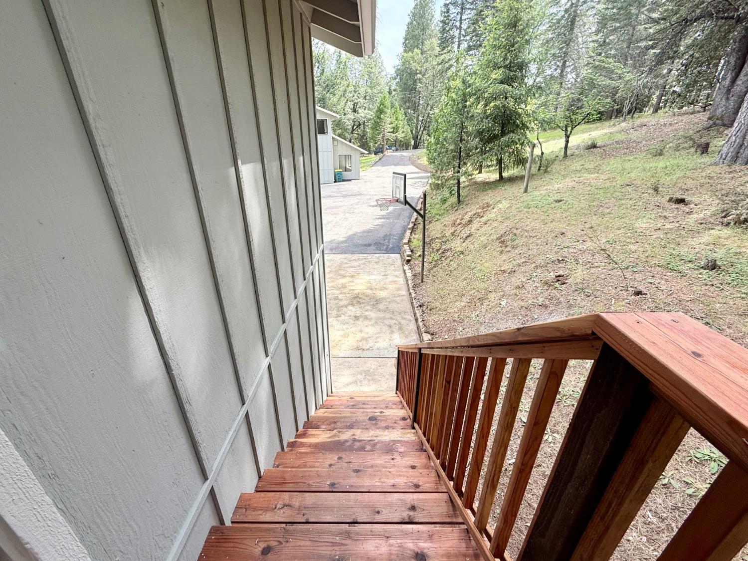 2506 Buffalo Hill Road Georgetown, CA 95634 - Photo 44 of 79 a view of a balcony with wooden floor and fence