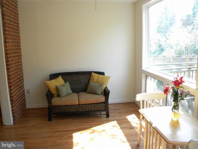 2210 Tunlaw Road Northwest Washington, DC 20007 - Photo 5 of 19 Den off kitchen and dining room