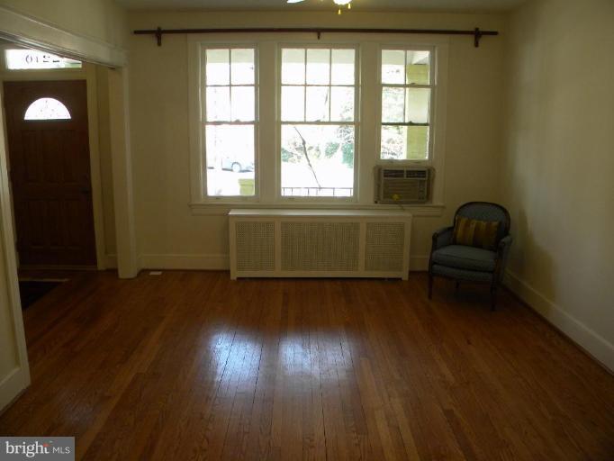 2210 Tunlaw Road Northwest Washington, DC 20007 - Photo 8 of 19 Living room from back den