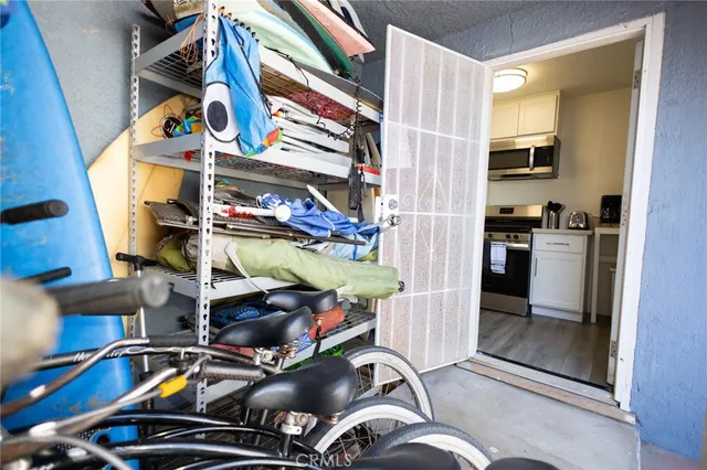 a storage and utility room with washer and dryer