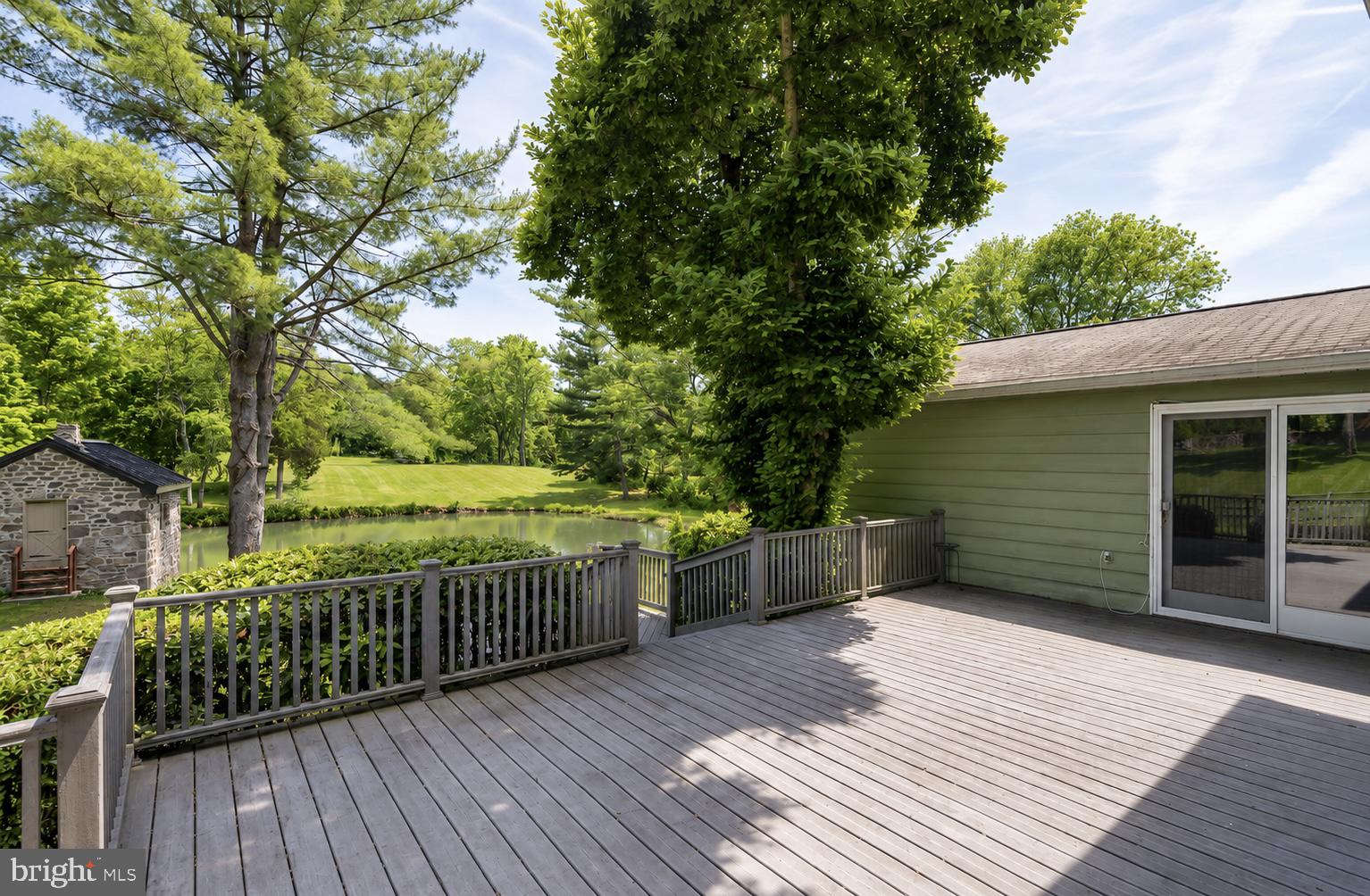 108 Sheeder Road Phoenixville, PA 19460 - Photo 28 of 42 a view of a deck with a large window and wooden floor