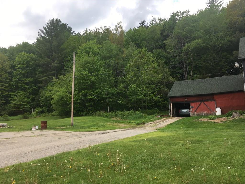 411 Ellis River Road Rumford, ME 04276 - Photo 2 of 26 Attached barn/ garage with over head...