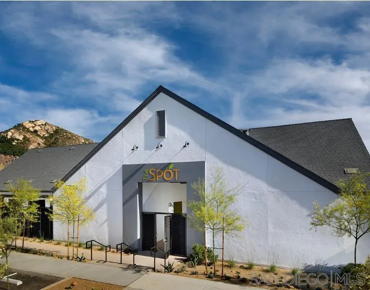 35365 Orchard Trail, Unit 457 Fallbrook, CA 92028 - Photo 4 of 12 a front view of a house with a yard