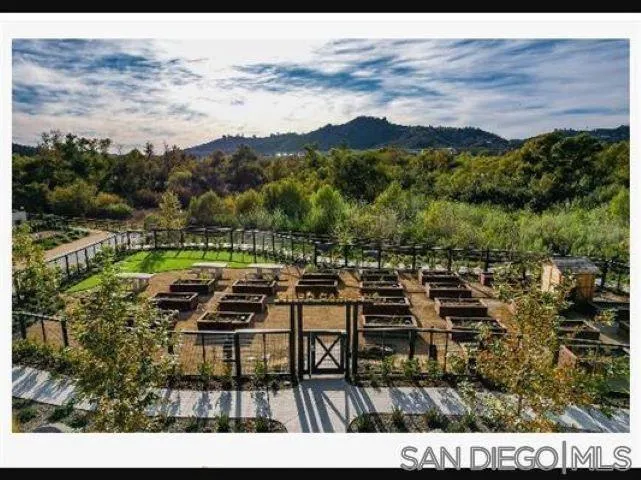 35365 Orchard Trail, Unit 457 Fallbrook, CA 92028 - Photo 9 of 12 a view of a terrace with a yard