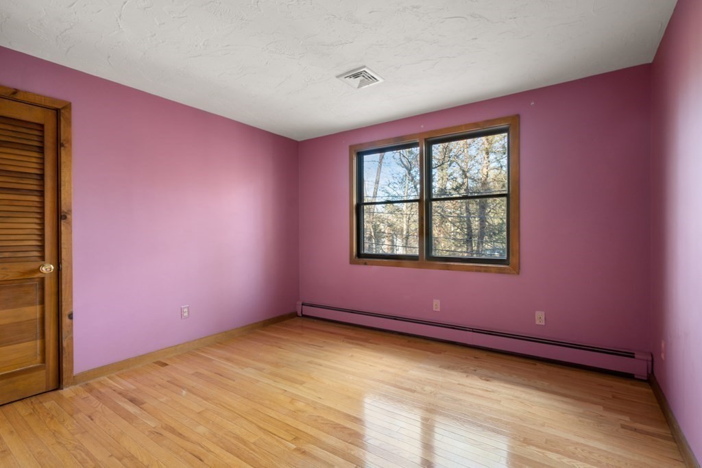 18 St Cloud Avenue Needham, MA 02492 - Photo 11 of 25 a view of an empty room with a window