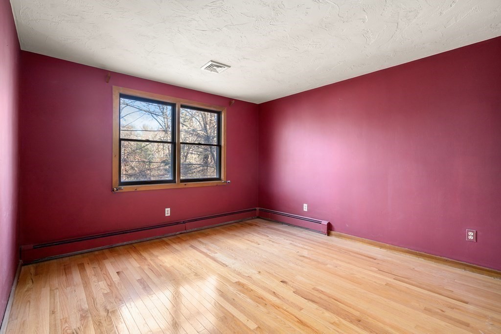 18 St Cloud Avenue Needham, MA 02492 - Photo 12 of 25 an empty room with a window