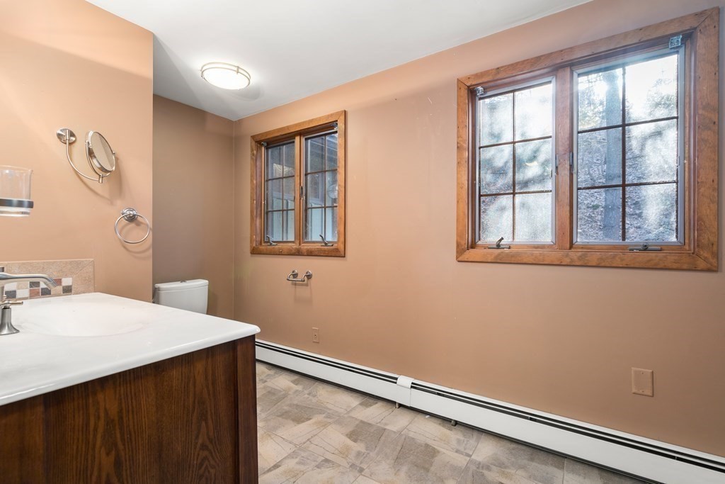 18 St Cloud Avenue Needham, MA 02492 - Photo 18 of 25 a room with a window and a dresser