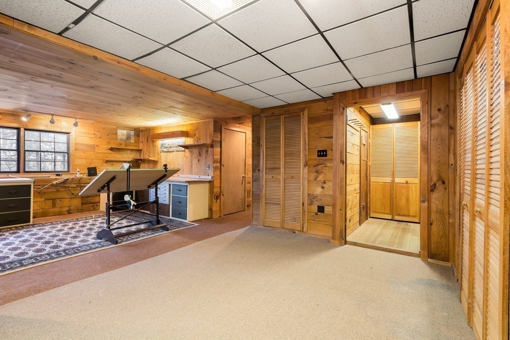 18 St Cloud Avenue Needham, MA 02492 - Photo 20 of 25 a view of a room with gym equipment