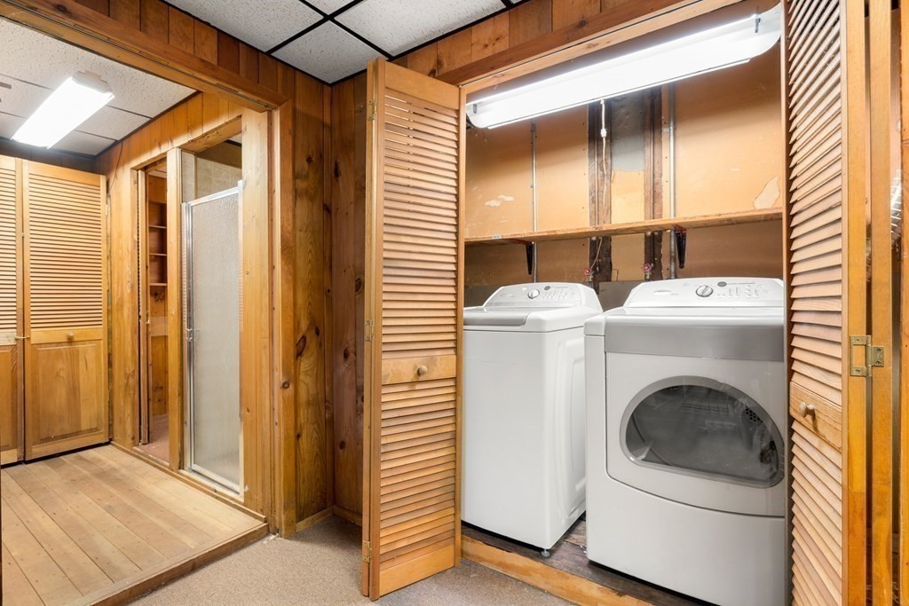 18 St Cloud Avenue Needham, MA 02492 - Photo 22 of 25 a utility room with dryer and washer