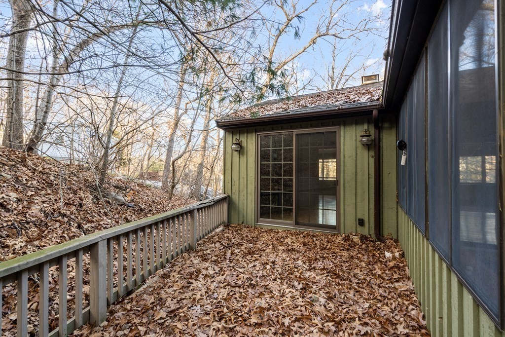 18 St Cloud Avenue Needham, MA 02492 - Photo 25 of 25 a view of a house with a large window and wooden fence