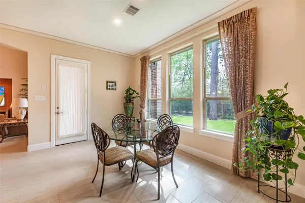 $815,000 | 1006 Blossom Field Lane, Pinehurst, TX 77362