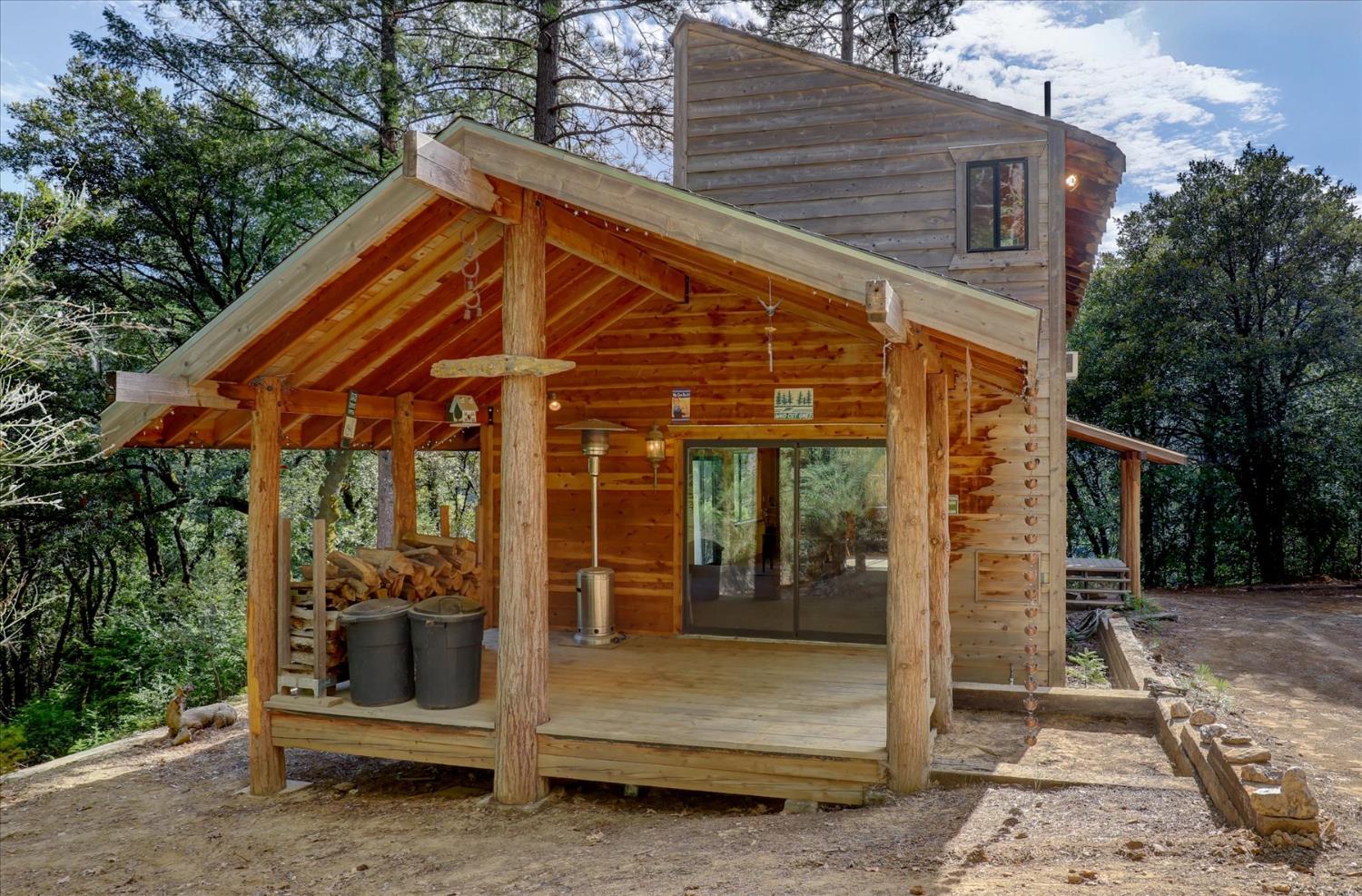 19455 Hogback Road Nevada City, CA 95959 - Photo 1 of 1 Cabin located below top building site. Has power and water. Air conditioner on top story. 2bathroom, large loft