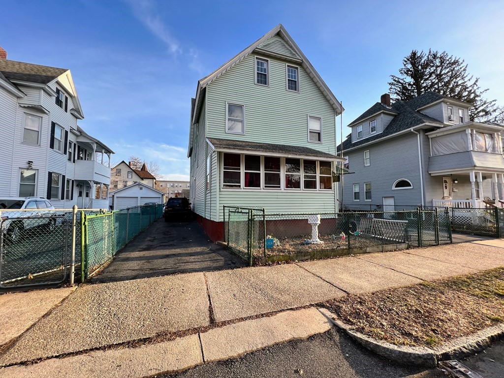 24 Keith Street Springfield, MA 01108 - Photo 1 of 7 a front view of a house with a yard