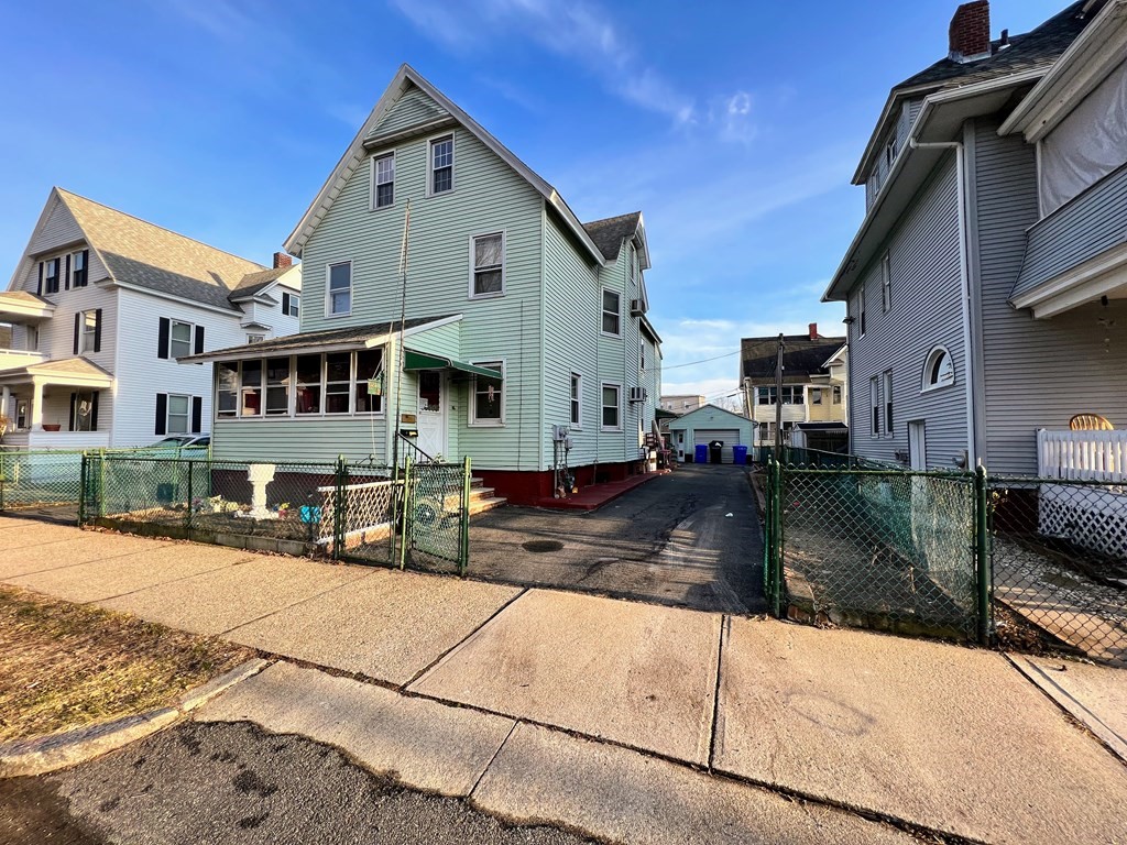 24 Keith Street Springfield, MA 01108 - Photo 2 of 7 a view of a street with buildings